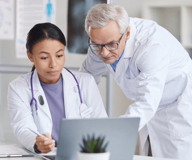 A doctor reviewing a patient's records